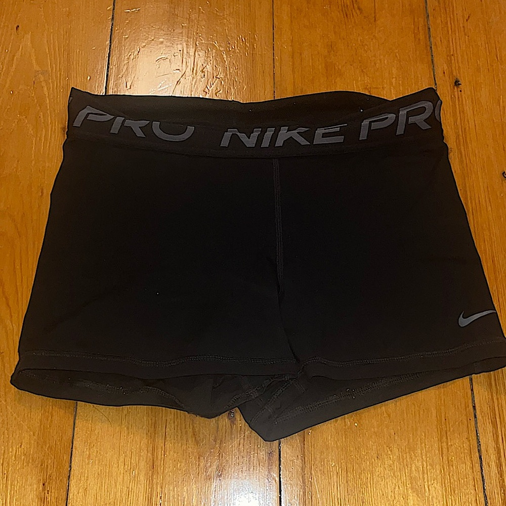 Grey and black nike pros